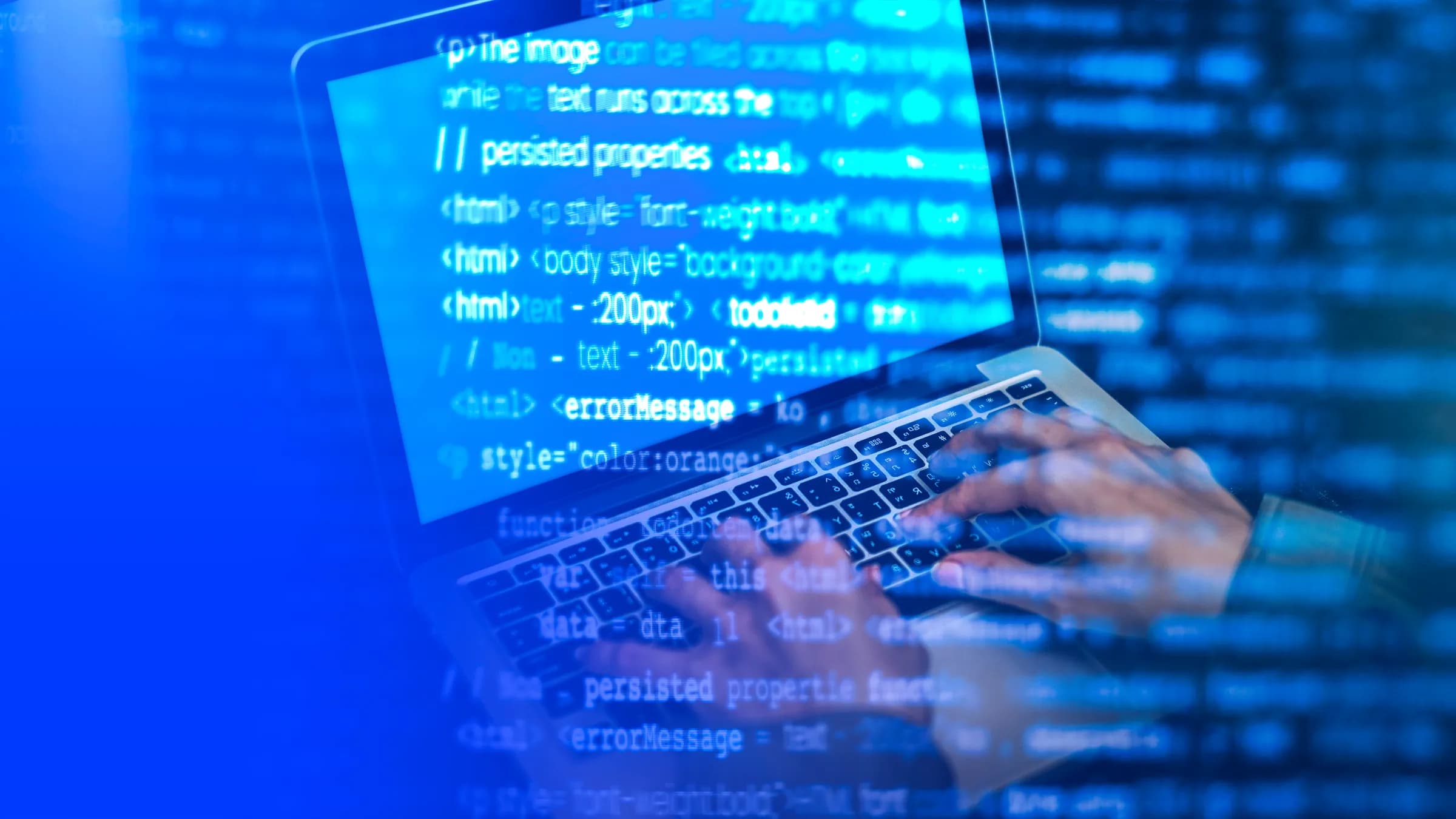 Hands typing code on a laptop with lines of code projected around